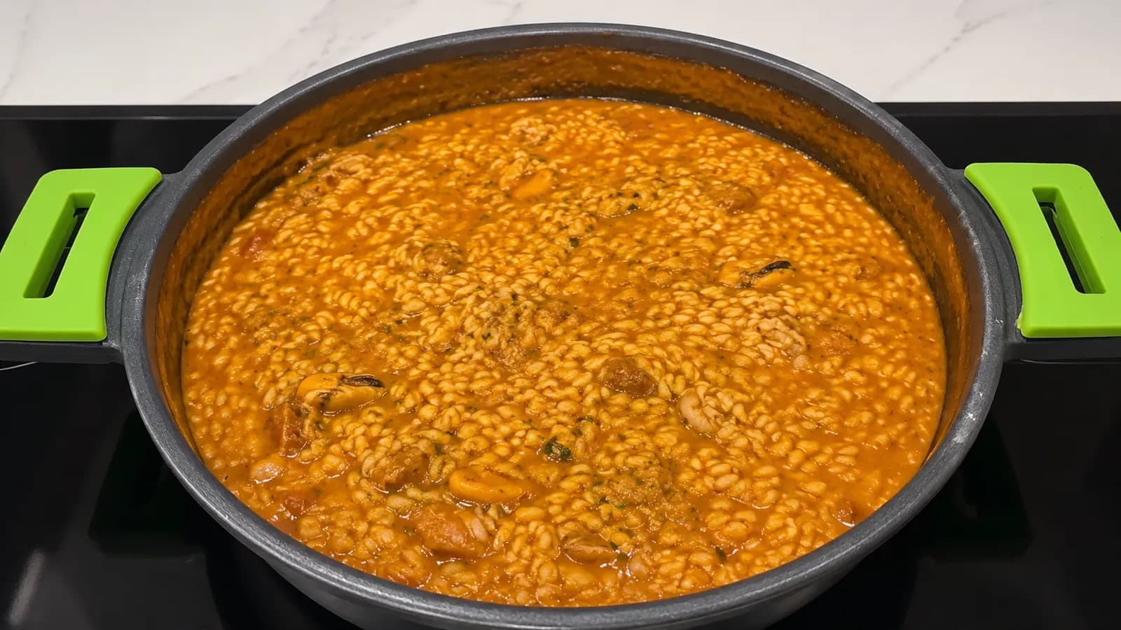 Arroz meloso de zamburiñas y calamar